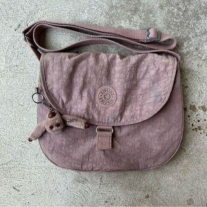 Pink Kipling crossbody bag with monkey charm